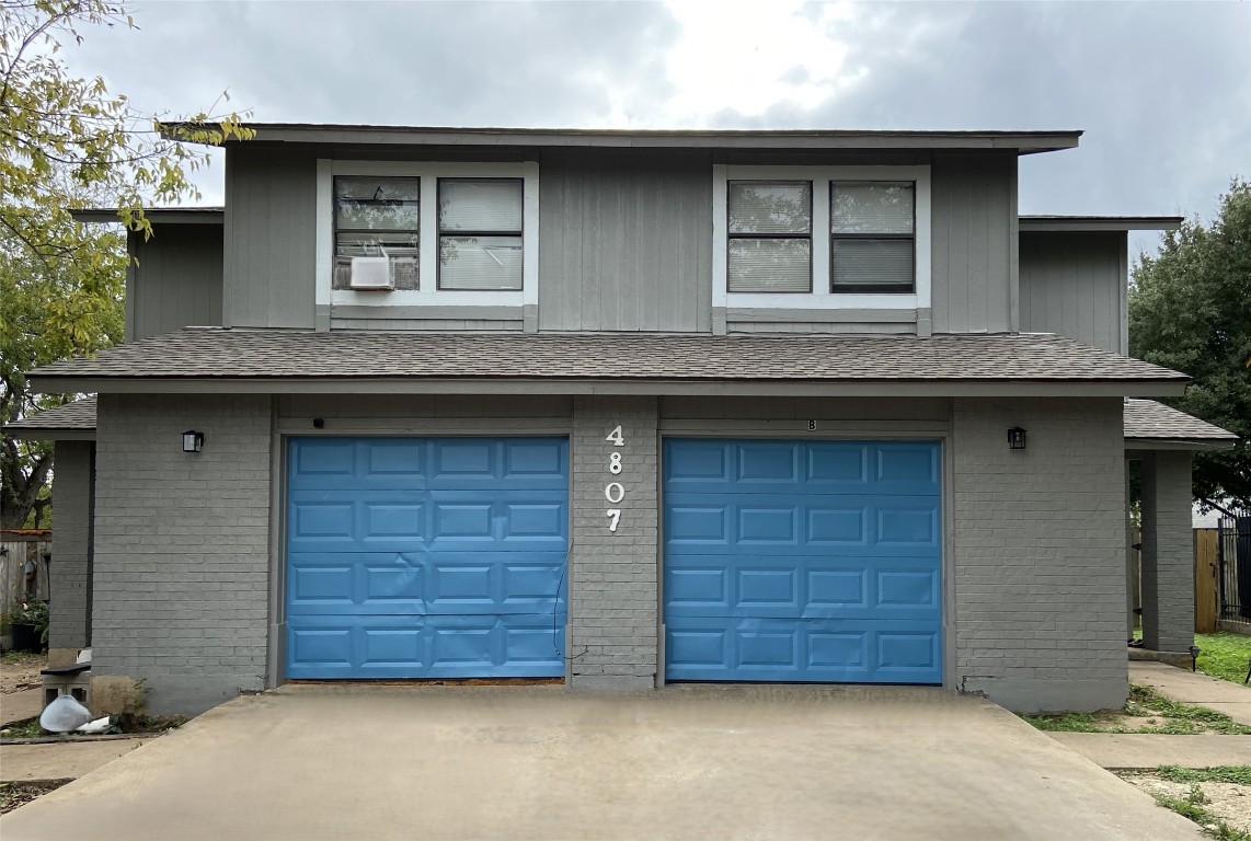 4807 Putters Cove, Unit A Austin, TX 78744 - Photo 1 of 10 a front view of a house