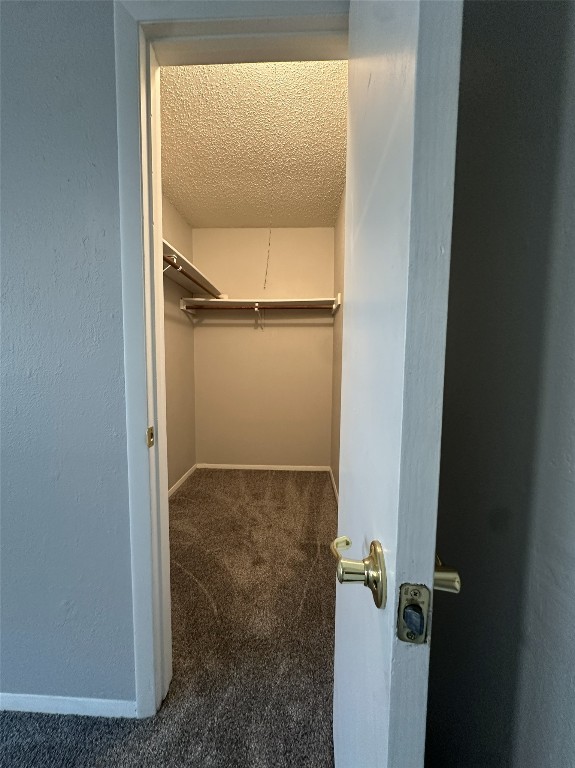4807 Putters Cove, Unit A Austin, TX 78744 - Photo 8 of 10 a bathroom with a glass shower door