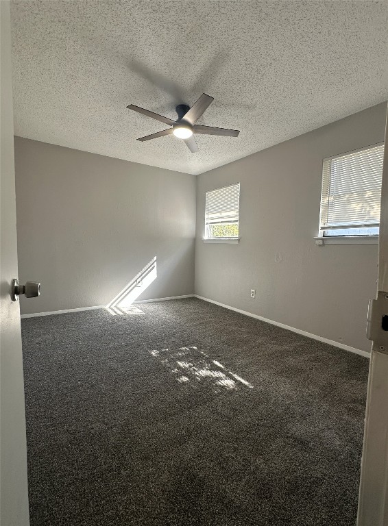4807 Putters Cove, Unit A Austin, TX 78744 - Photo 9 of 10 a view of an empty room with a window