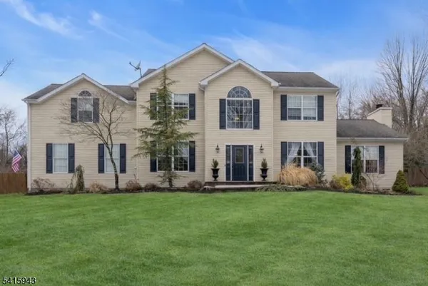 a front view of house with yard
