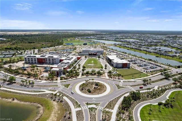 an aerial view of a house with a ocean view