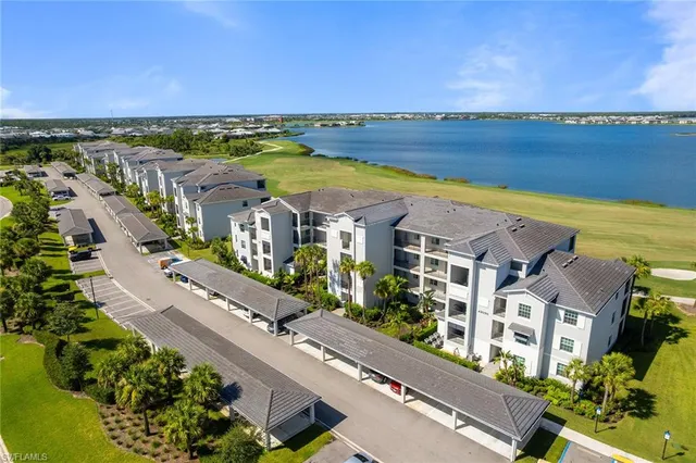 an aerial view of a house with a swimming pool