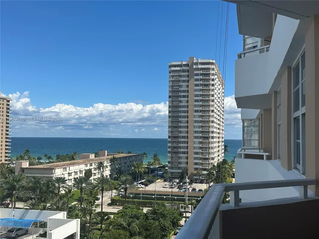 a view of a city with tall buildings