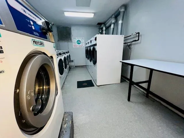 a utility room with dryer and washer