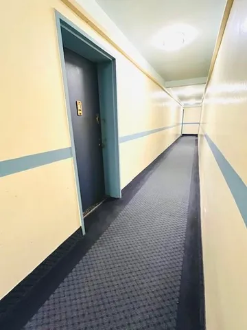 a view of hallway with stairs