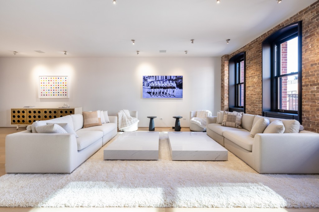 60 Beach Street, Unit 6A Manhattan, NY 10013 - Photo 1 of 1 a living room with furniture large window and a large window