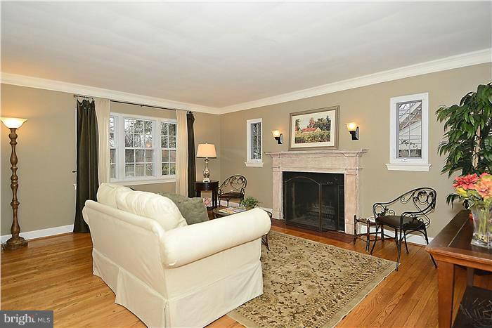 1911 Stratton Road Silver Spring, MD 20910 - Photo 3 of 12 Living Room with wood burning fireplace