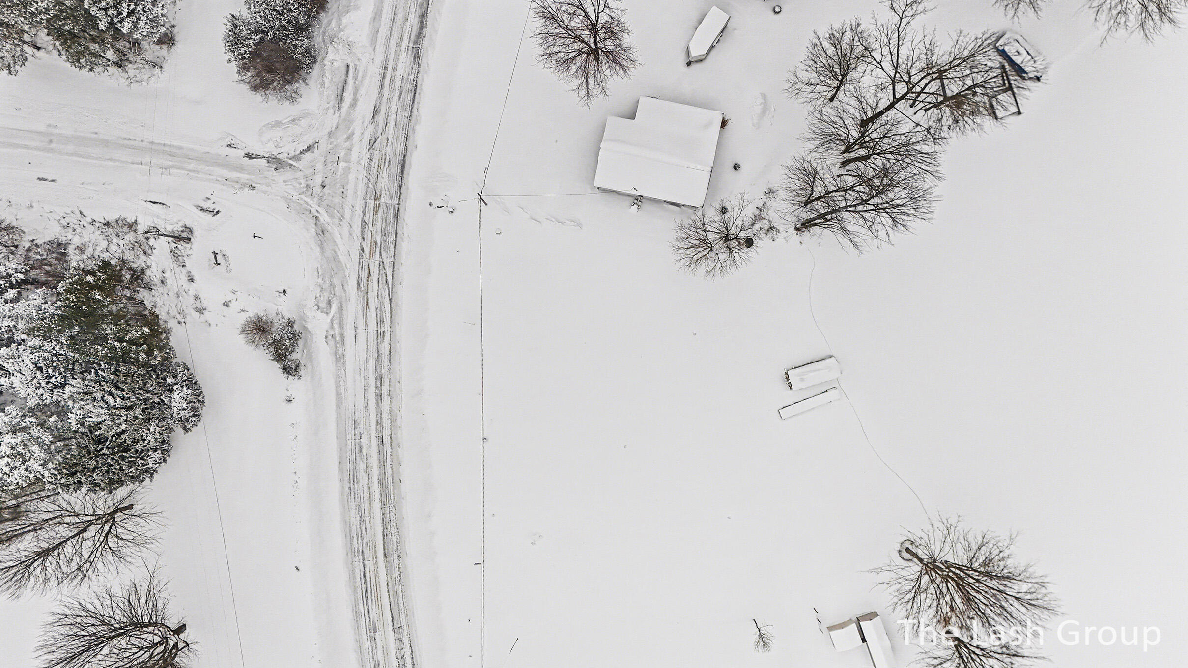 9758 10 Mile Road Northeast Rockford, MI 49341 - Photo 7 of 13 DJI_20260121131506_0017_D