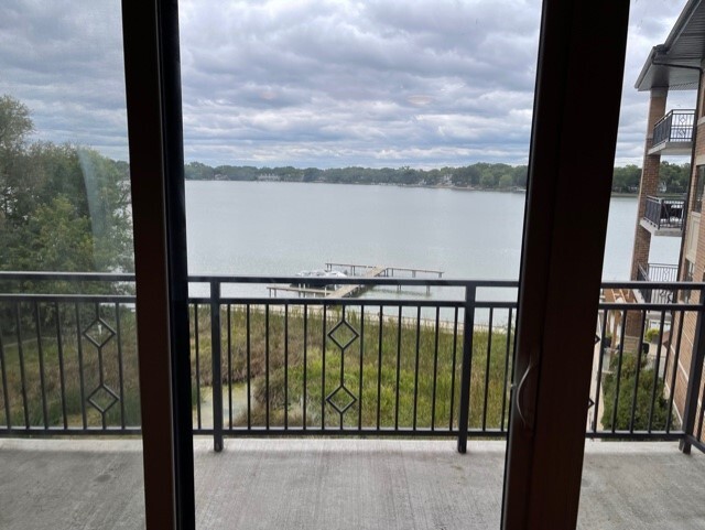 728 North Diamond Lake Road, Unit 205 Mundelein, IL 60060 - Photo 18 of 19 a view of a balcony