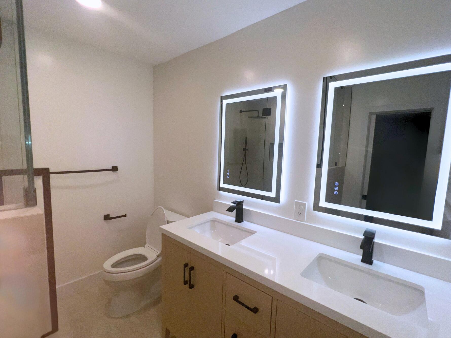 1260 Manor Drive Riviera Beach, FL 33404 - Photo 16 of 56 Dual lighted mirrors
