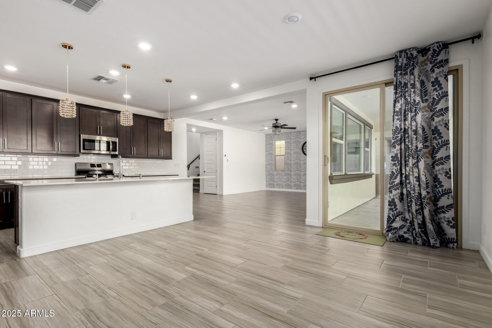 1156 East Weatherby Way Chandler, AZ 85286 - Photo 13 of 47 a view of kitchen with stainless steel appliances refrigerator oven and cabinets