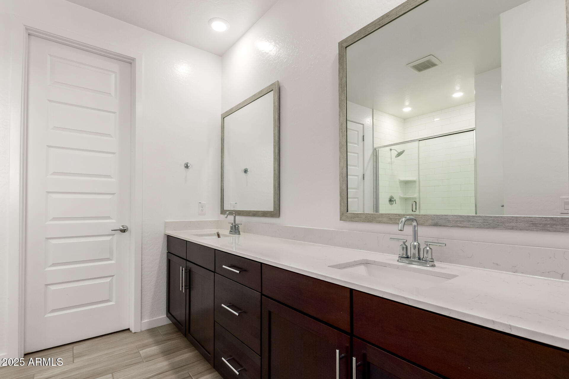 1156 East Weatherby Way Chandler, AZ 85286 - Photo 22 of 47 a bathroom with a double vanity sink and a mirror