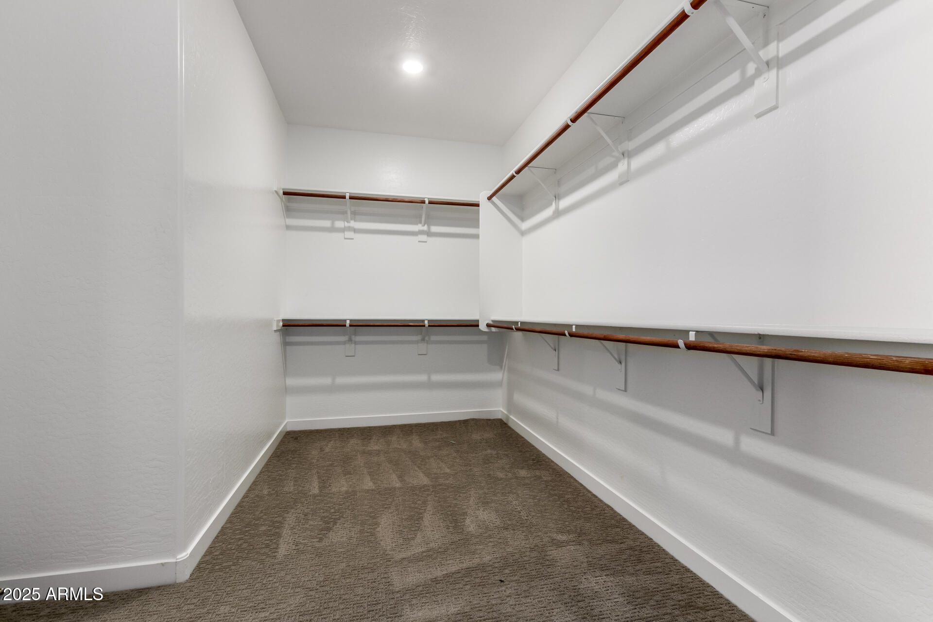 1156 East Weatherby Way Chandler, AZ 85286 - Photo 24 of 47 a view of a room with racks on the wall