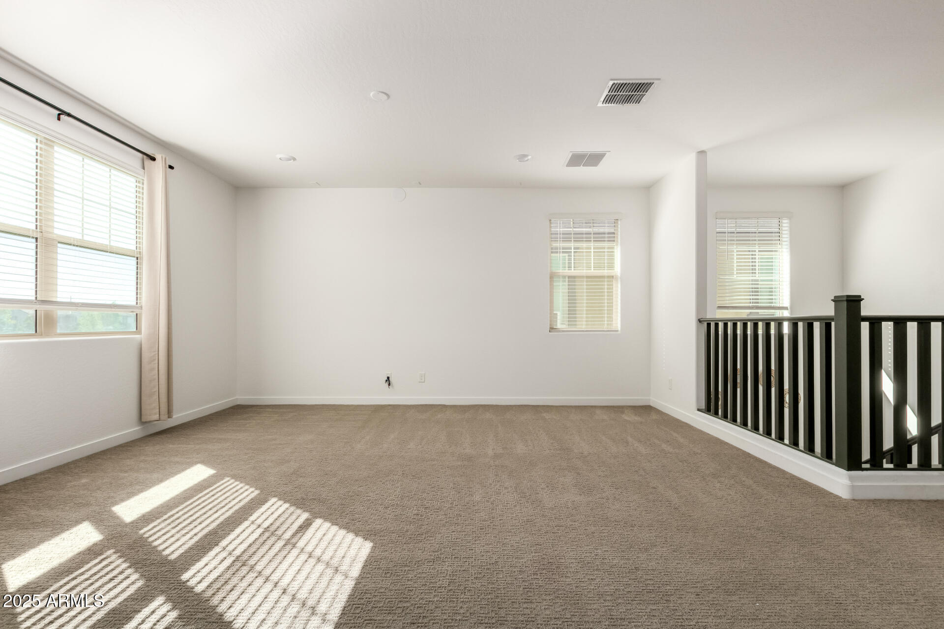 1156 East Weatherby Way Chandler, AZ 85286 - Photo 32 of 47 an empty room with windows