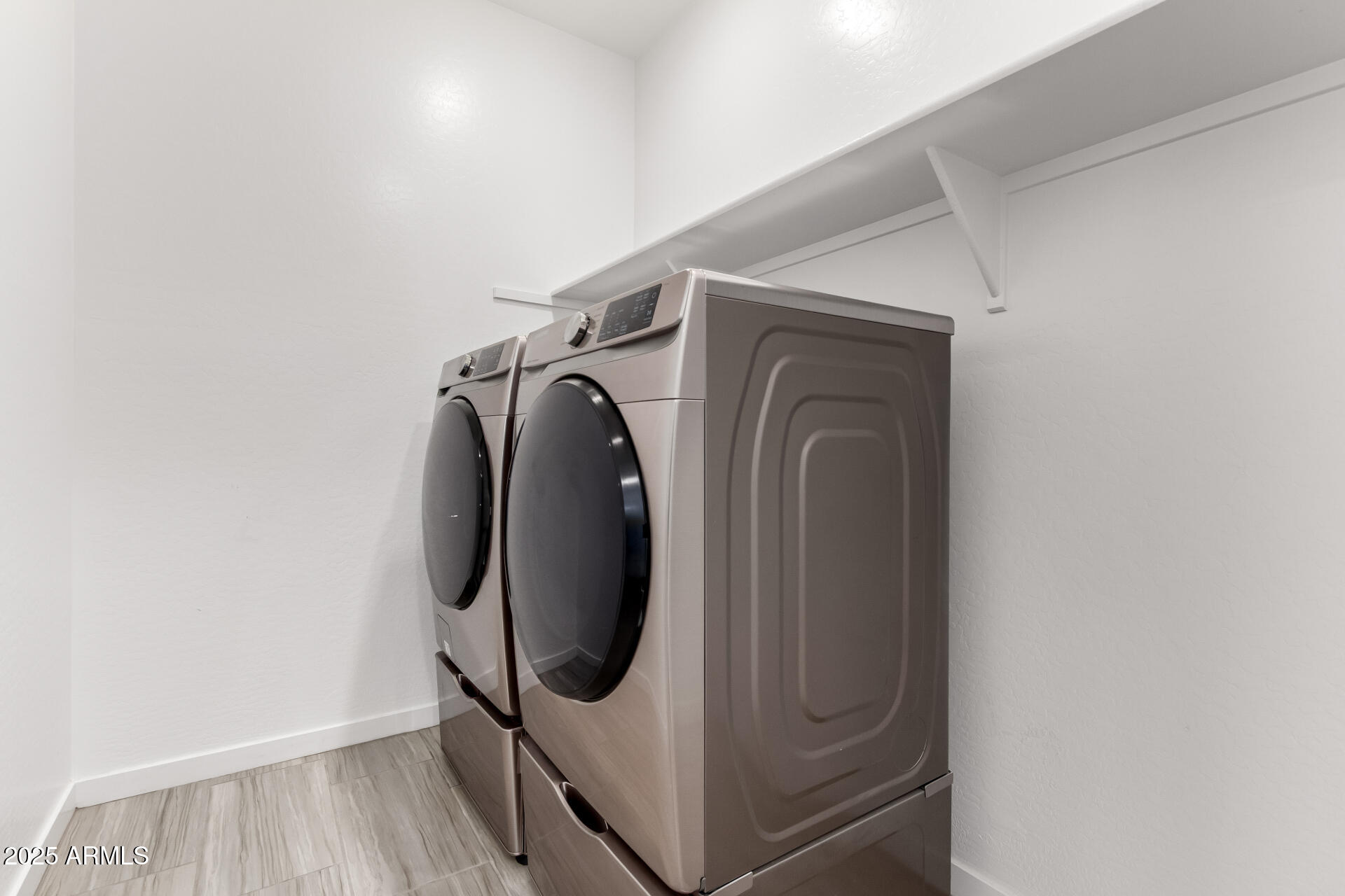 1156 East Weatherby Way Chandler, AZ 85286 - Photo 36 of 47 a utility room with dryer and washer