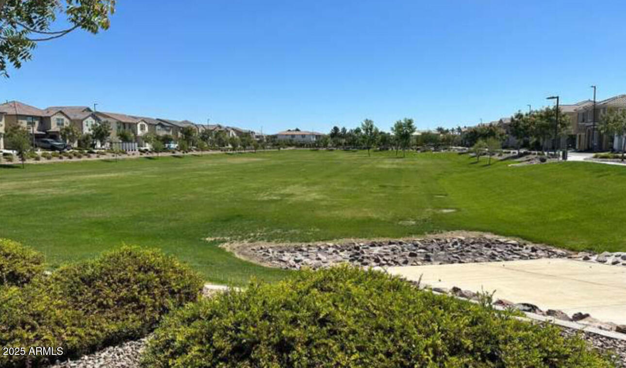1156 East Weatherby Way Chandler, AZ 85286 - Photo 41 of 47 a view of a golf course with a lake