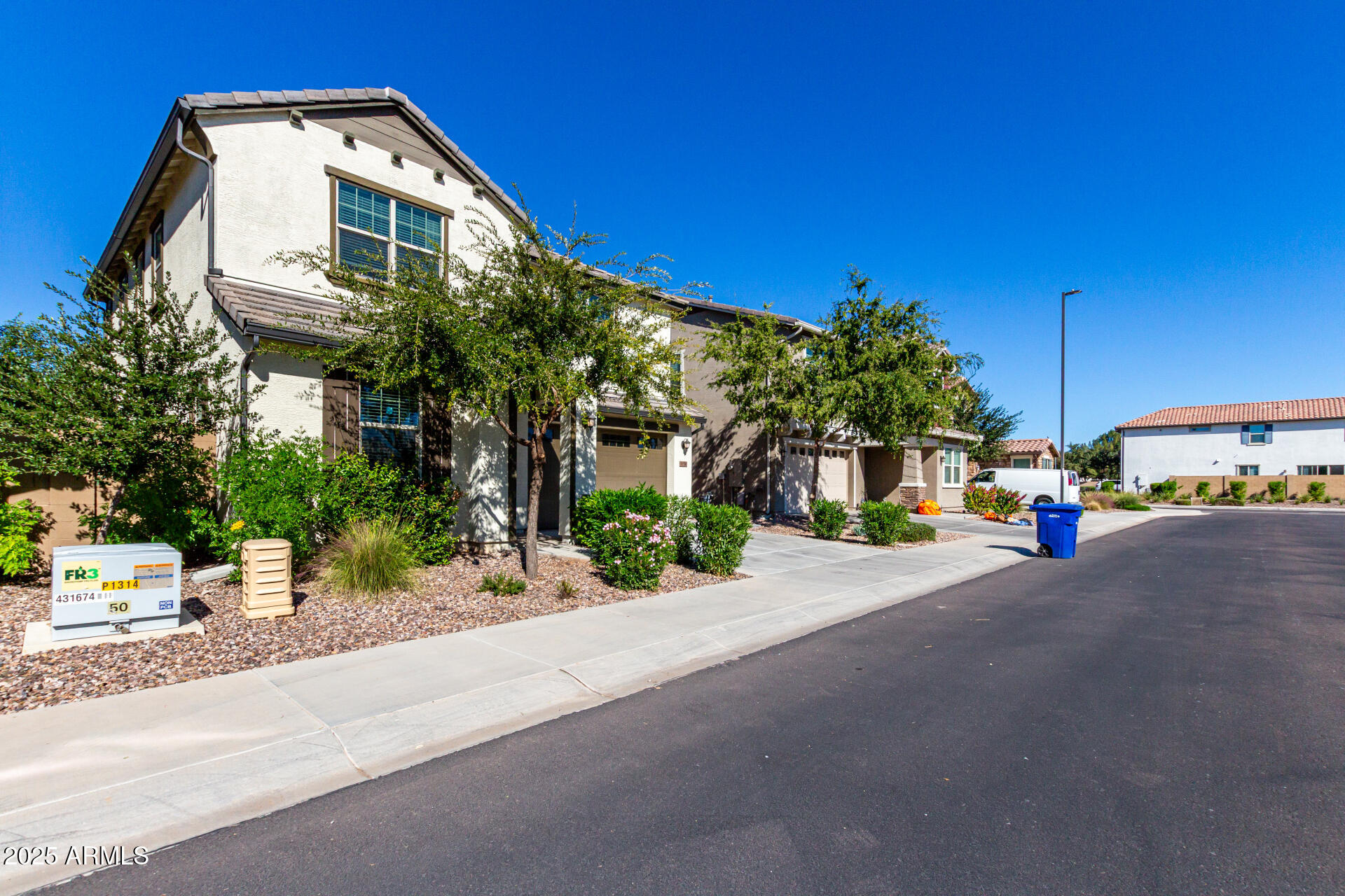 1156 East Weatherby Way Chandler, AZ 85286 - Photo 5 of 47 a front view of a house with a yard