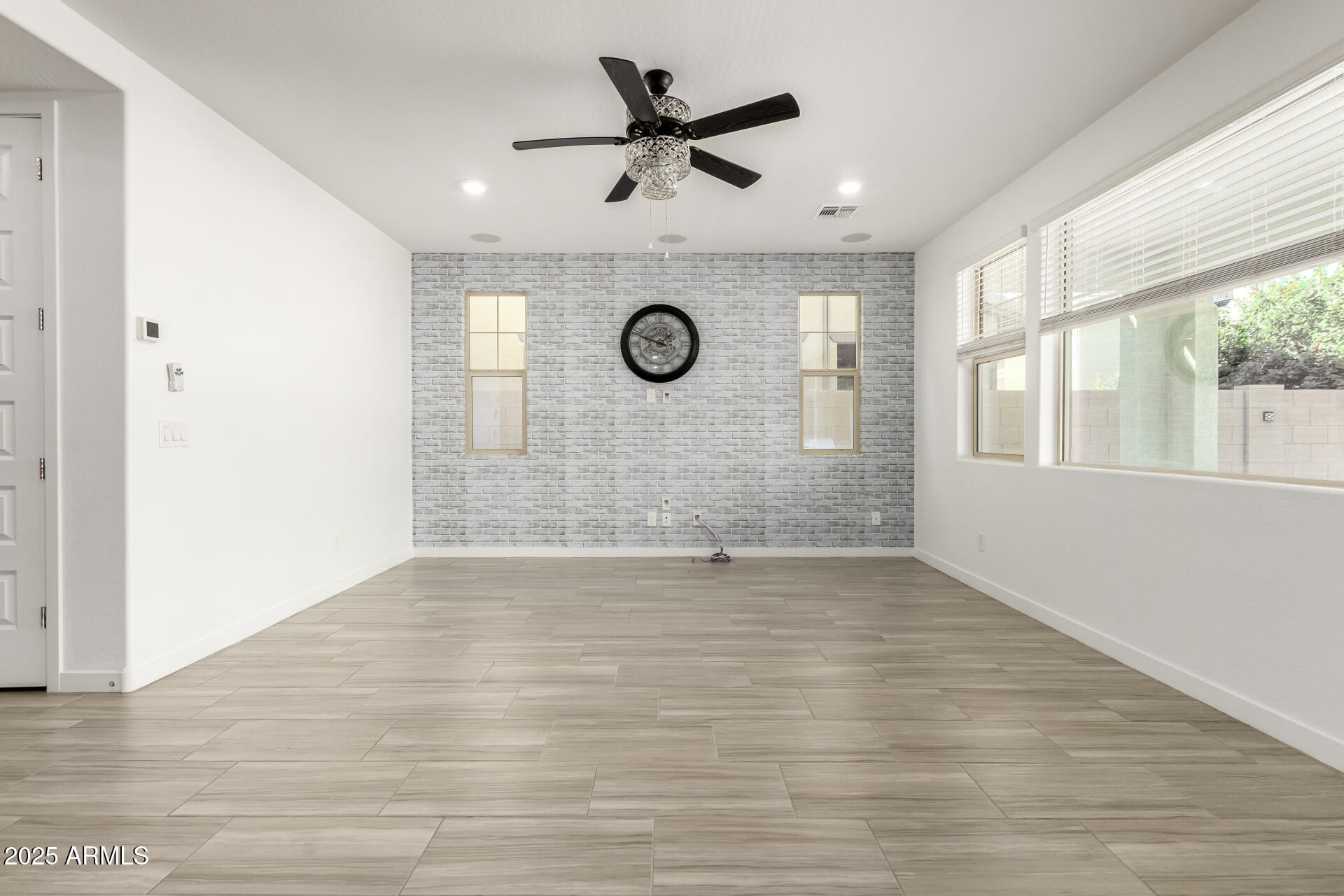 1156 East Weatherby Way Chandler, AZ 85286 - Photo 8 of 47 a view of an empty room with a window