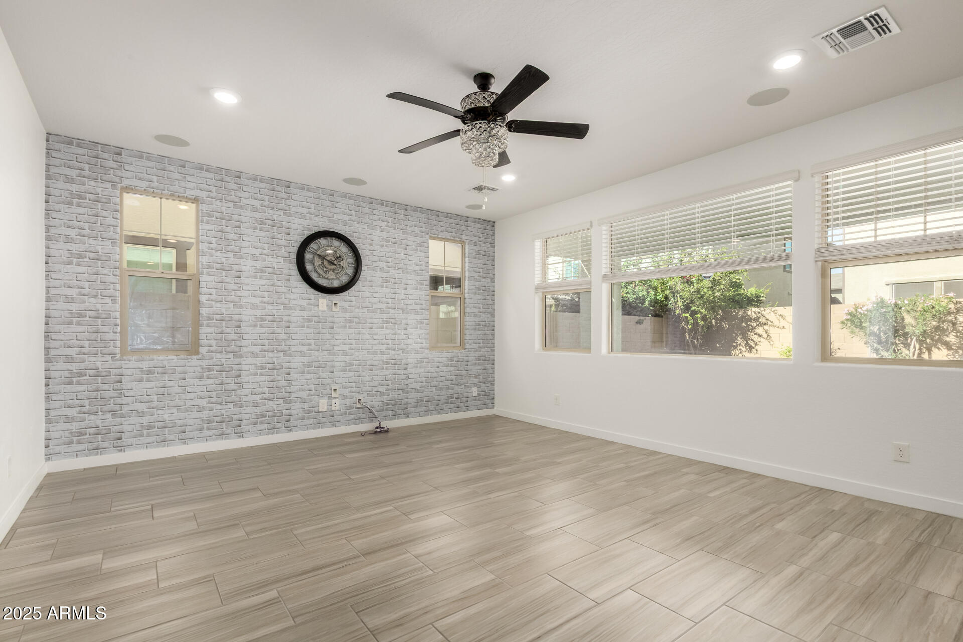 1156 East Weatherby Way Chandler, AZ 85286 - Photo 9 of 47 a view of an empty room with a window