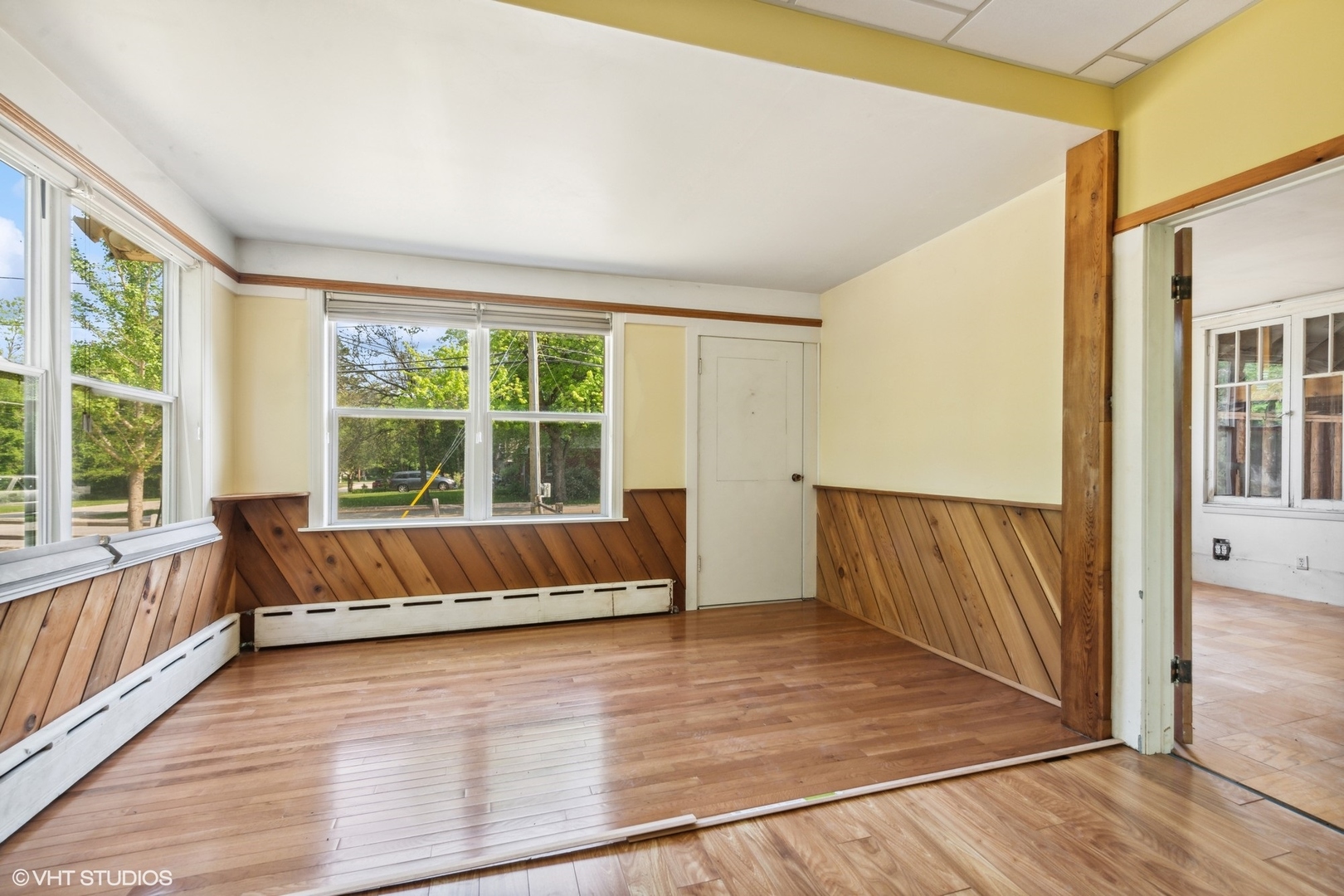 903 Lincoln Avenue Fox River Grove, IL 60021 - Photo 3 of 19 a view of a room with wooden floor and furniture