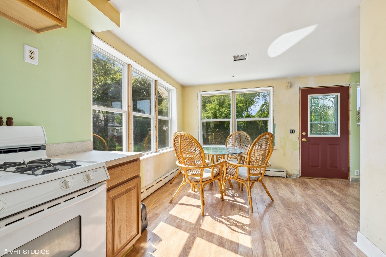 903 Lincoln Avenue Fox River Grove, IL 60021 - Photo 7 of 19 a dining room with furniture and wooden floor