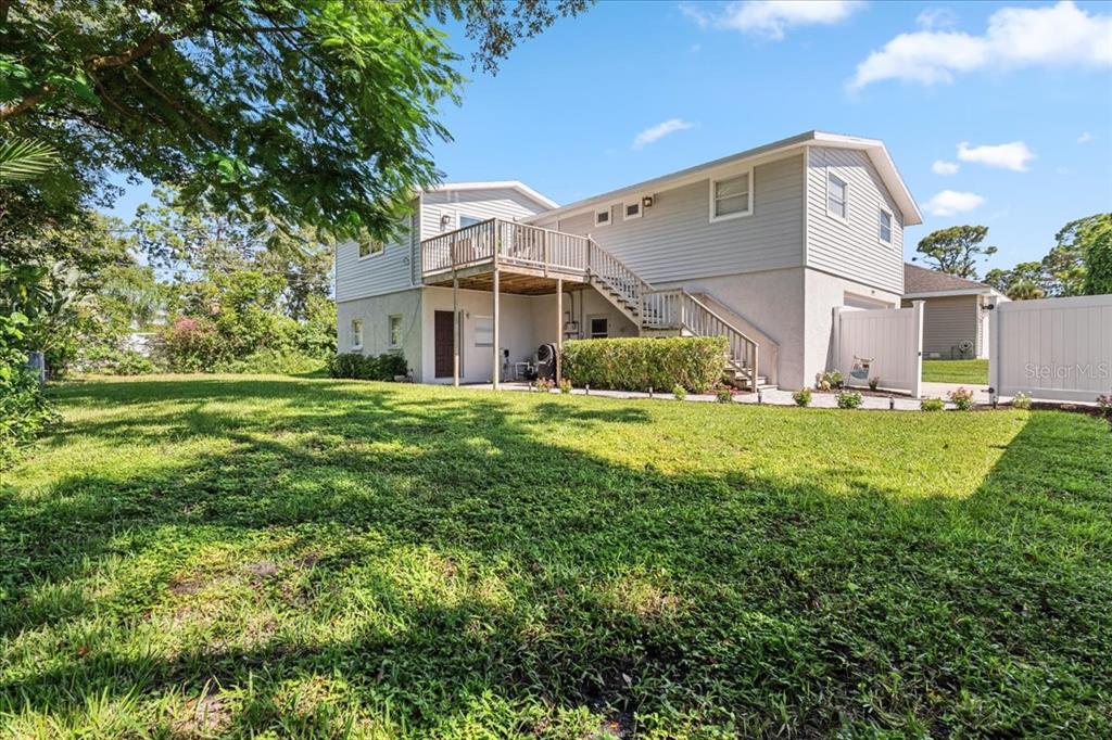 5919 Diana Road Venice, FL 34293 - Photo 1 of 1 a view of a house with a big yard and large trees