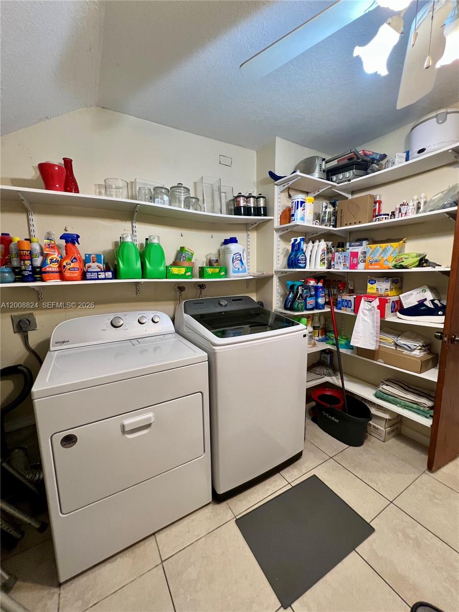 3610 Southwest 113th Place Miami, FL 33165 - Photo 20 of 49 a utility room with washer and dryer