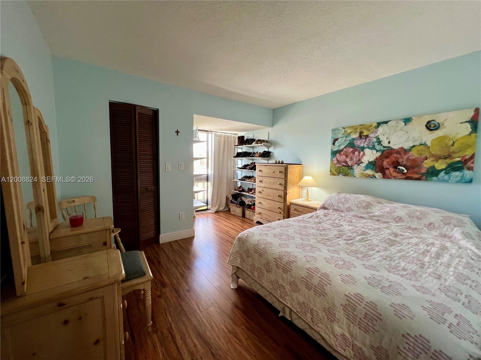 3610 Southwest 113th Place Miami, FL 33165 - Photo 31 of 49 a bed room with a bed and a television
