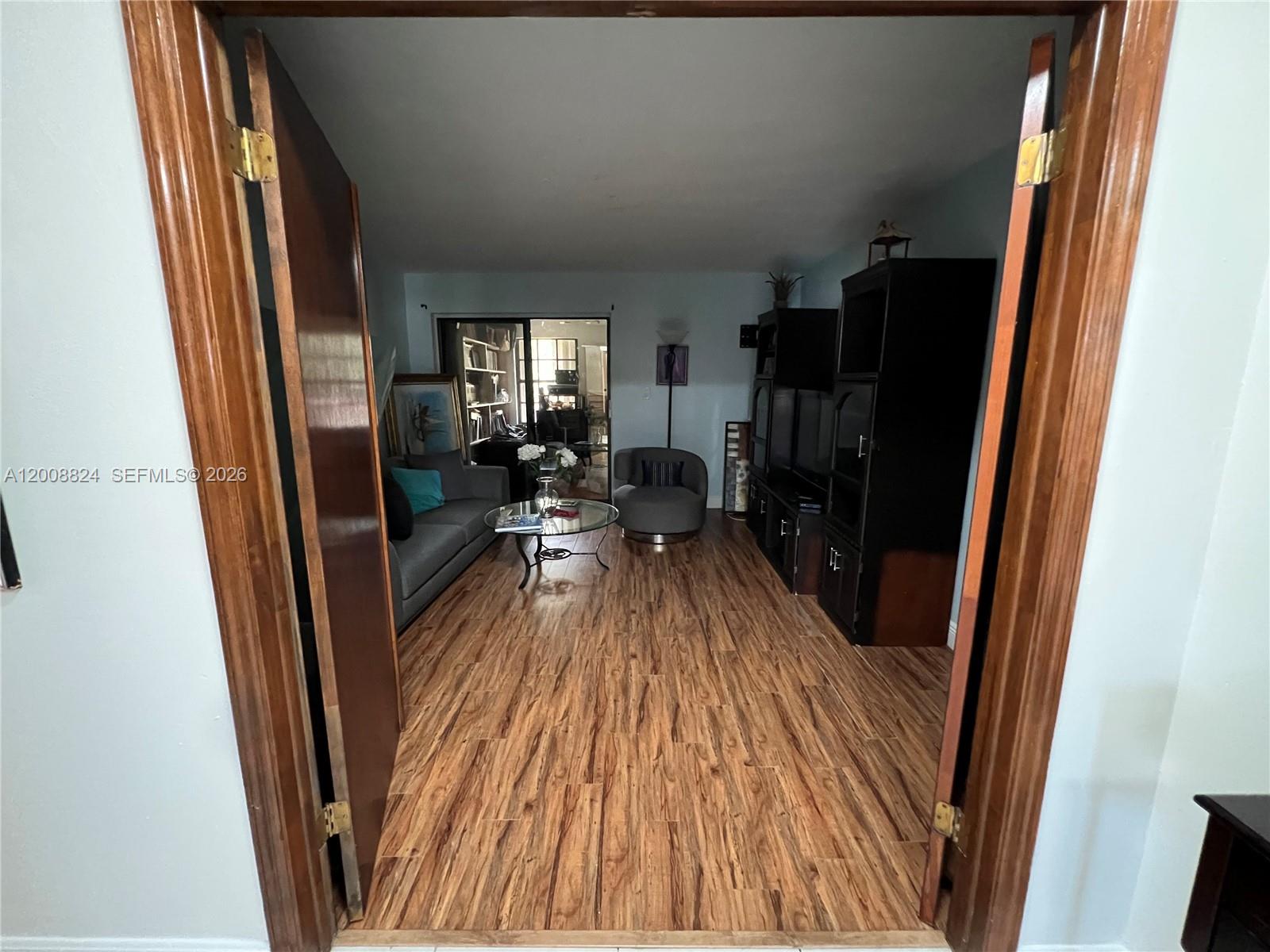 3610 Southwest 113th Place Miami, FL 33165 - Photo 35 of 49 a view of living room and wooden floor