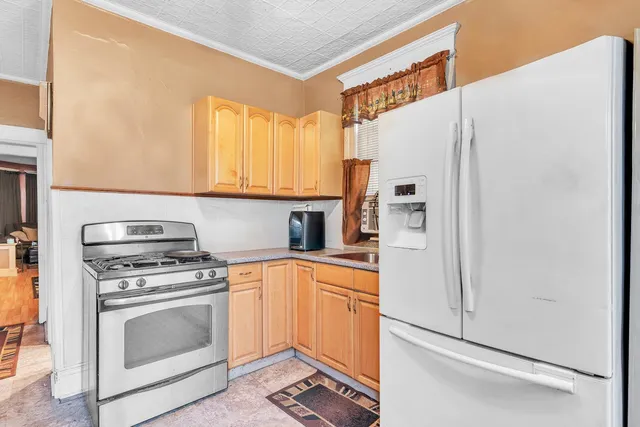 a bathroom with a toilet a sink and a mirror