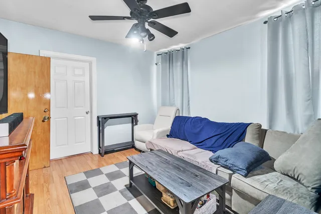 a kitchen with stainless steel appliances granite countertop a refrigerator sink and stove