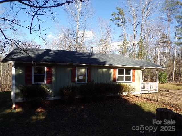 75 Bradley Turn Mill Spring, NC 28756 - Photo 11 of 20 a front view of a house with a yard