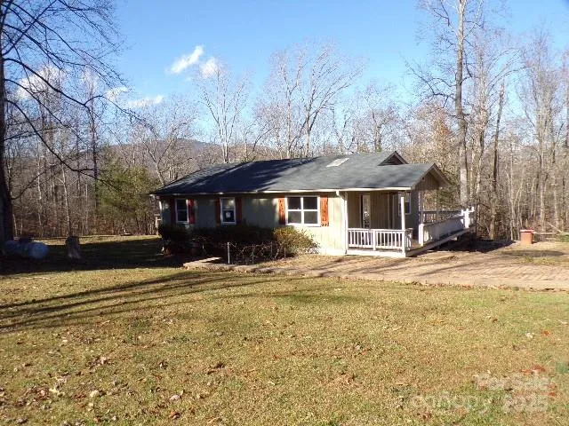 a view of balcony with wooden floor