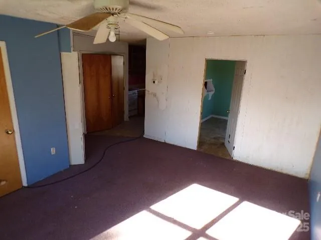 a view of a room that has a window