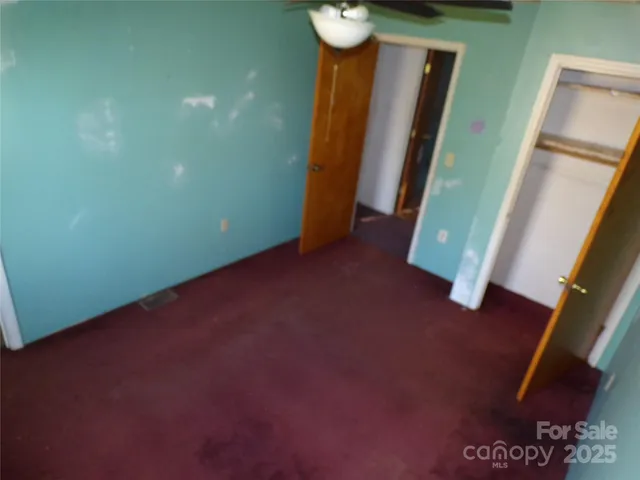 a bathroom with a toilet and a sink