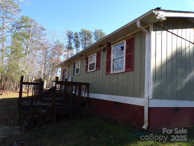 75 Bradley Turn Mill Spring, NC 28756 - Photo 6 of 20 a backyard of a house with lots of green space