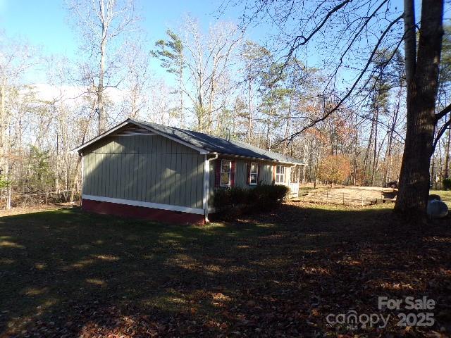 75 Bradley Turn Mill Spring, NC 28756 - Photo 10 of 20 a view of house with backyard
