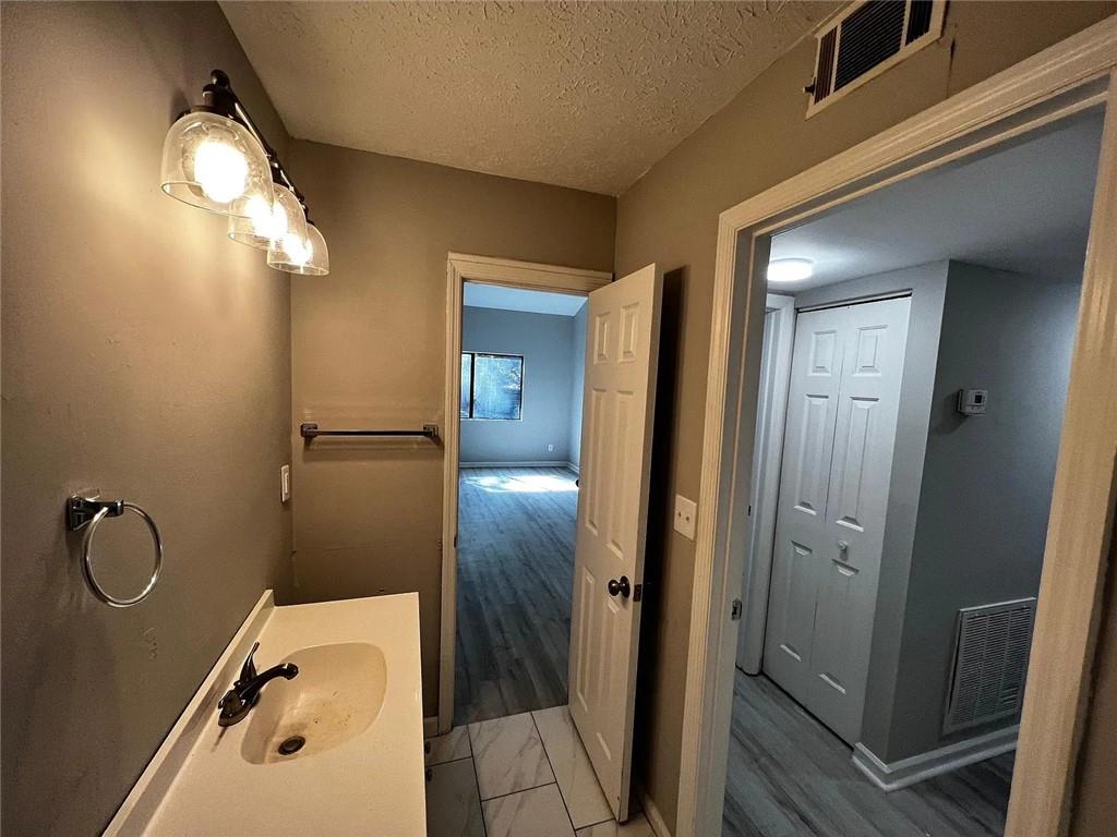 3932 Darryl Lane Gainesville, GA 30506 - Photo 15 of 34 a bathroom with a tub and shower