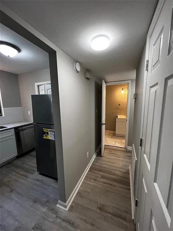 3932 Darryl Lane Gainesville, GA 30506 - Photo 16 of 34 a view of a hallway view with wooden floor and staircase