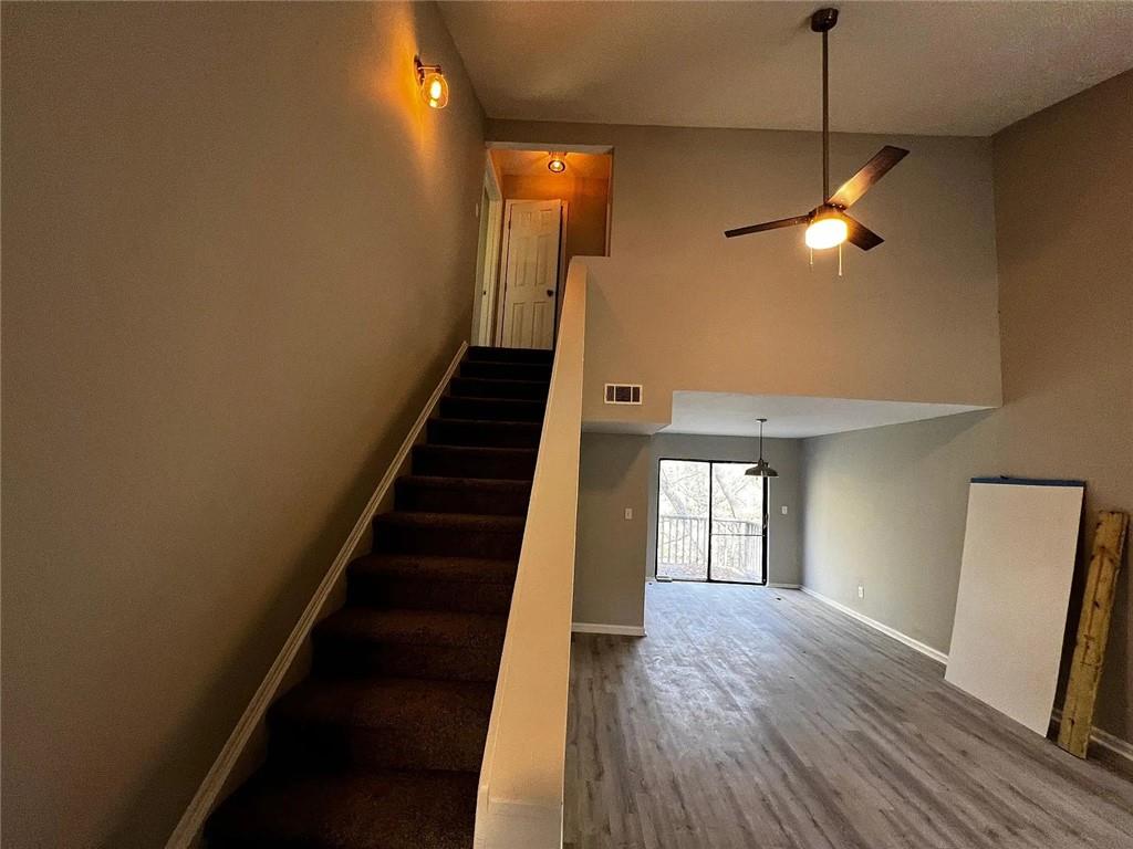 3932 Darryl Lane Gainesville, GA 30506 - Photo 27 of 34 a view of empty room with wooden floor and fan