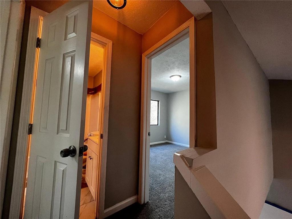 3932 Darryl Lane Gainesville, GA 30506 - Photo 30 of 34 a view of a hallway with windows and closet