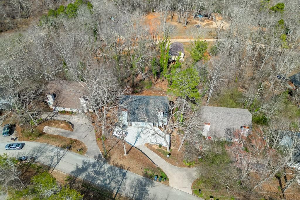 3932 Darryl Lane Gainesville, GA 30506 - Photo 3 of 34 a view of a yard with plants and large trees