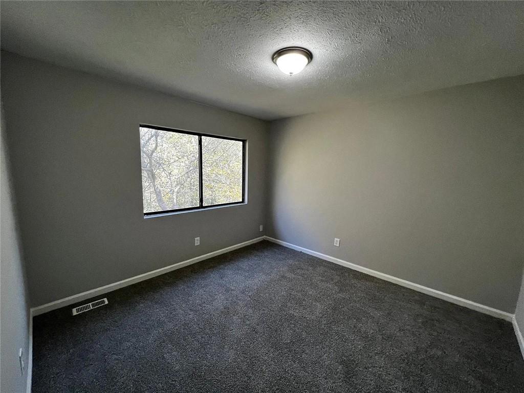 3932 Darryl Lane Gainesville, GA 30506 - Photo 6 of 34 an empty room with windows