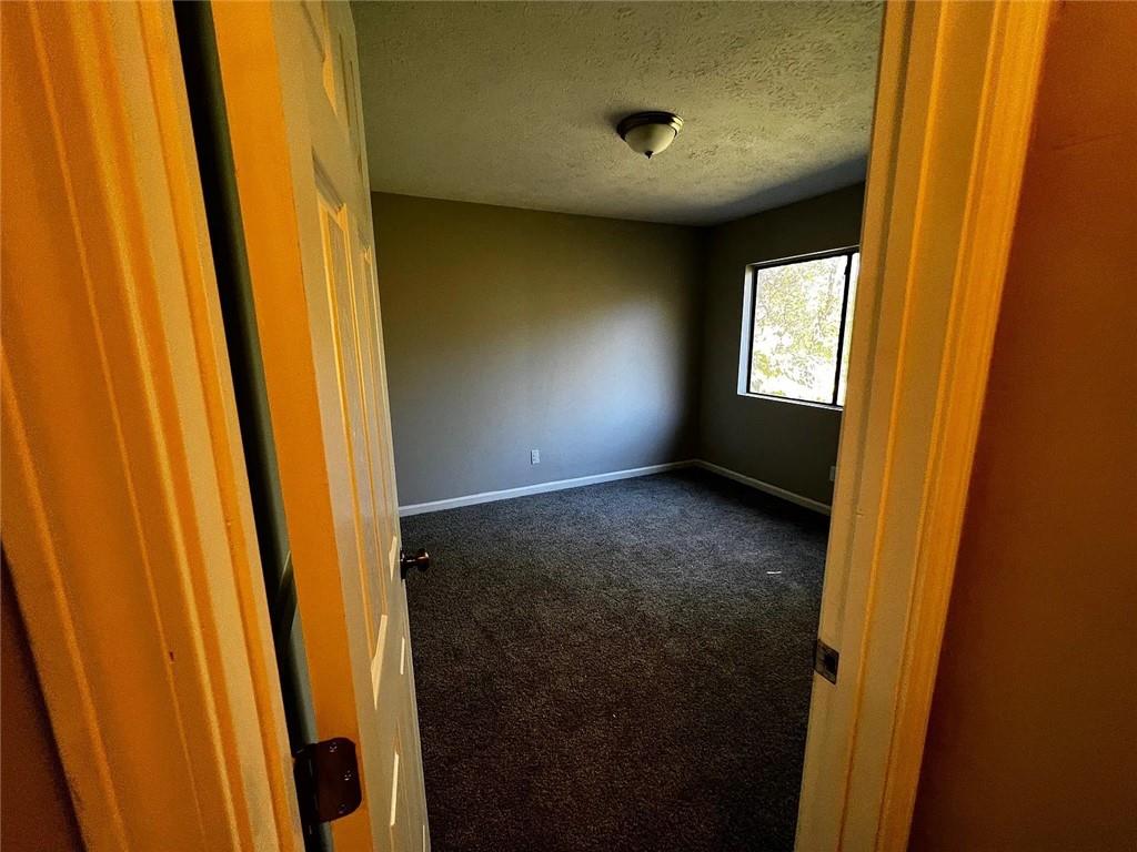 3932 Darryl Lane Gainesville, GA 30506 - Photo 9 of 34 a view of empty room with windows