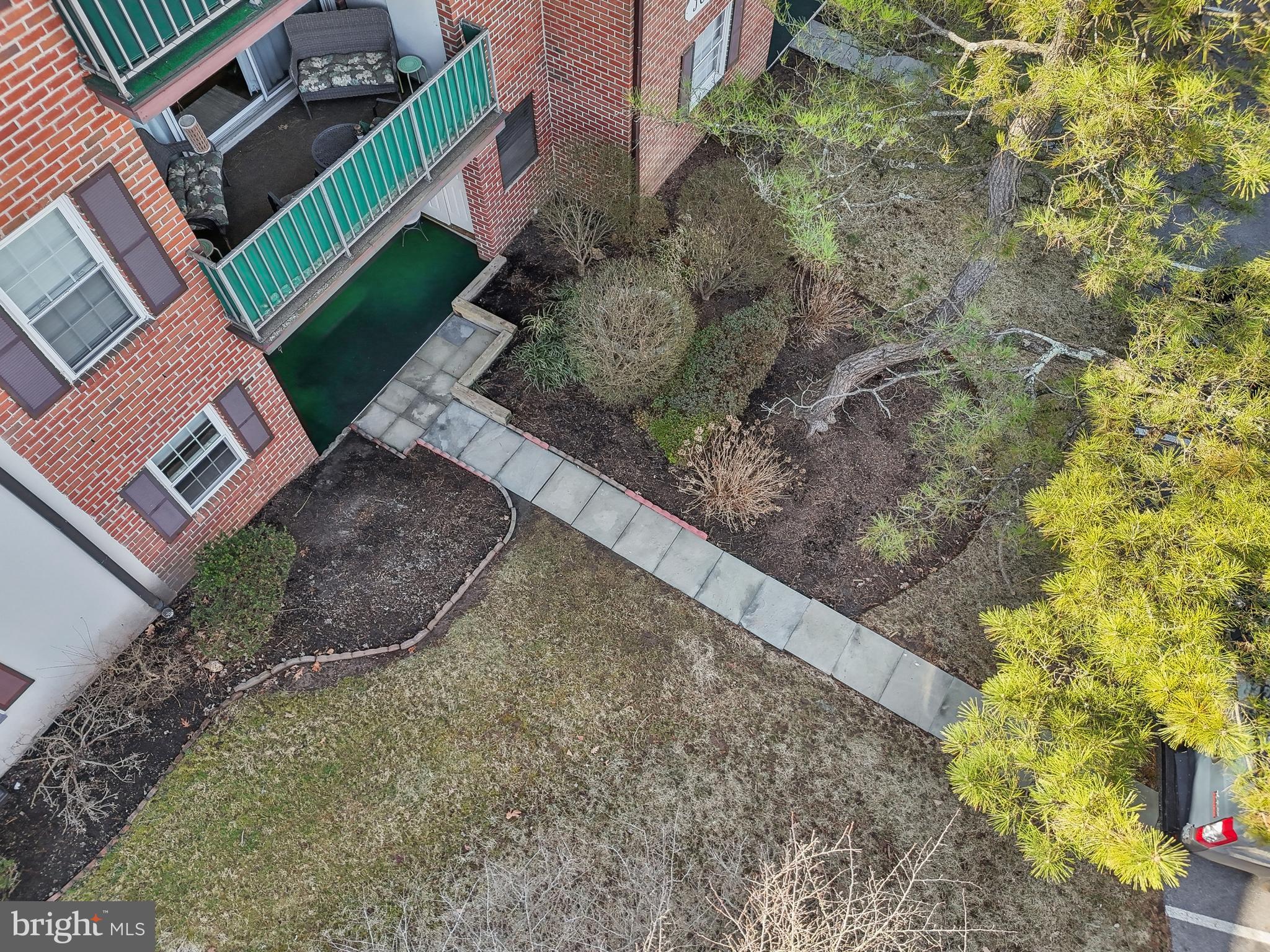 203 Drummers Lane, Unit 203 Wayne, PA 19087 - Photo 27 of 40 a view of a yard with plants