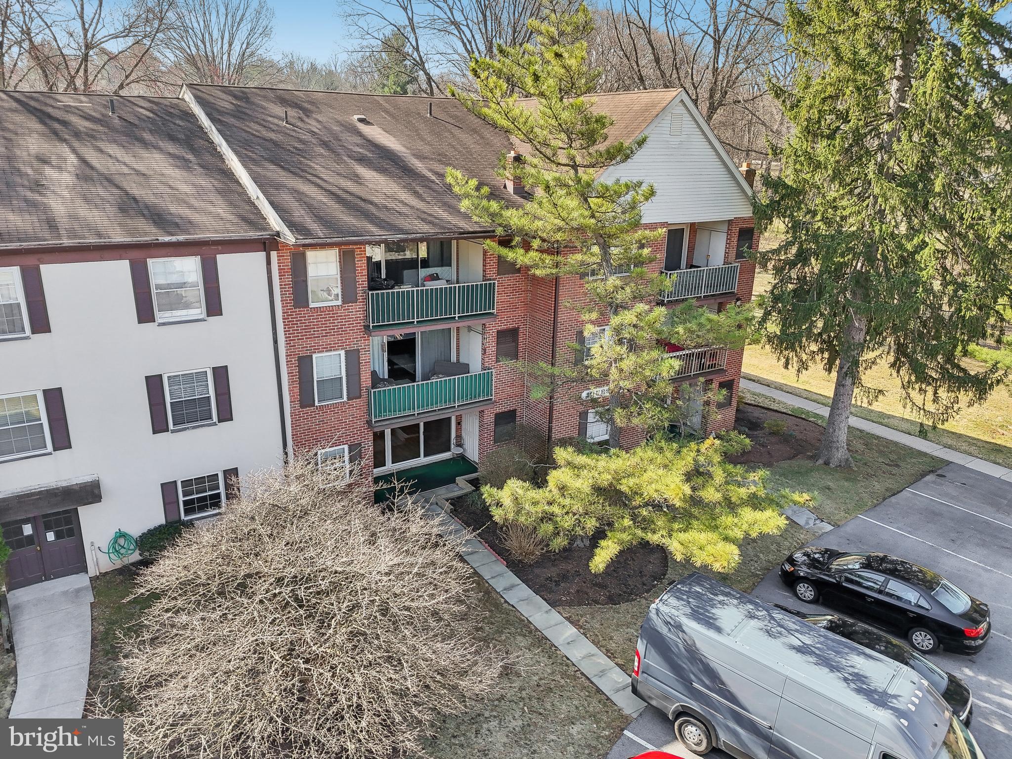 203 Drummers Lane, Unit 203 Wayne, PA 19087 - Photo 33 of 40 a front view of a house with a yard