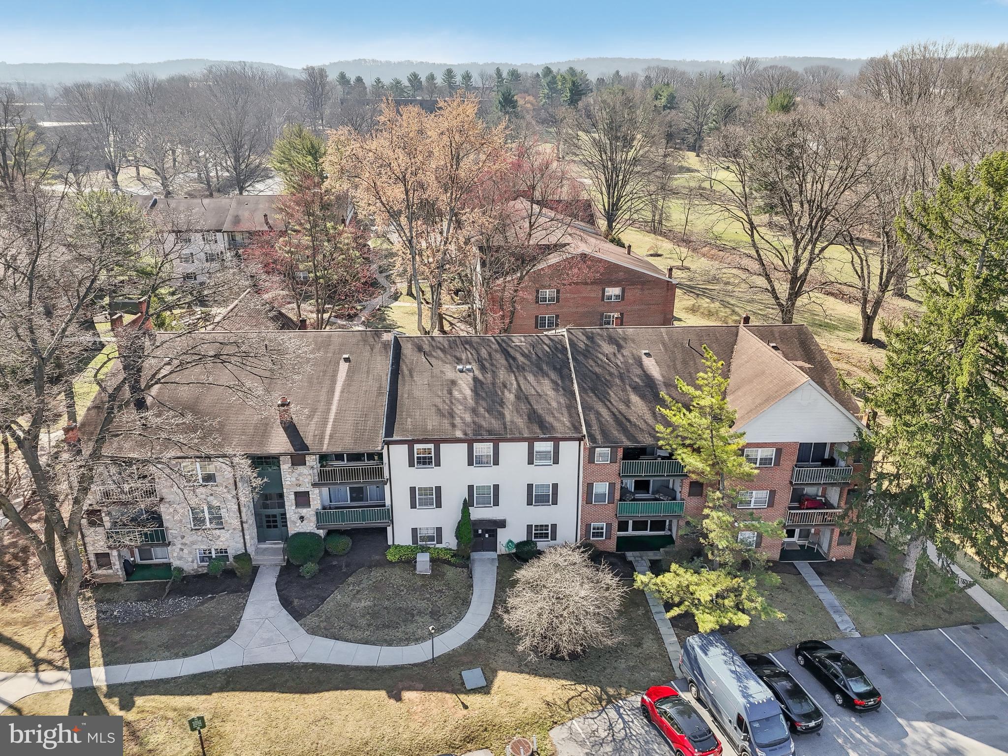 203 Drummers Lane, Unit 203 Wayne, PA 19087 - Photo 34 of 40 an aerial view of multiple house