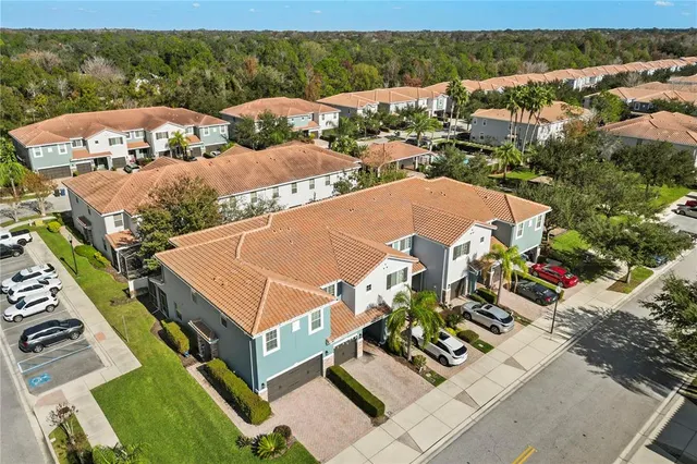 an aerial view of a house with a garden
