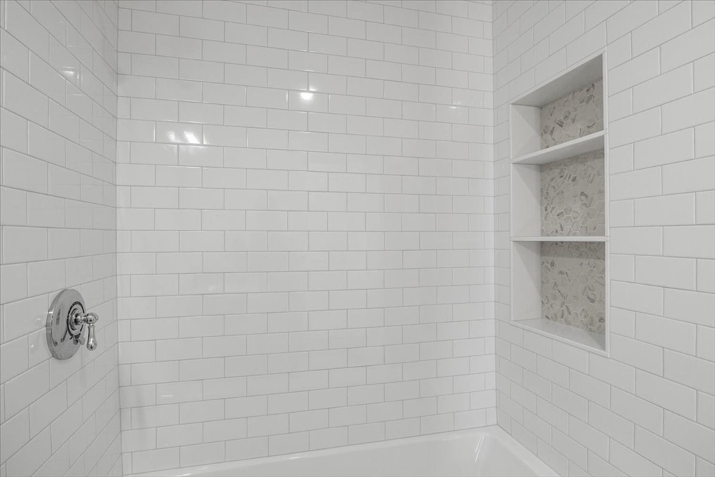 558 Lagrange Street, Unit 1 Boston, MA 02132 - Photo 26 of 40 a bathroom with a shower