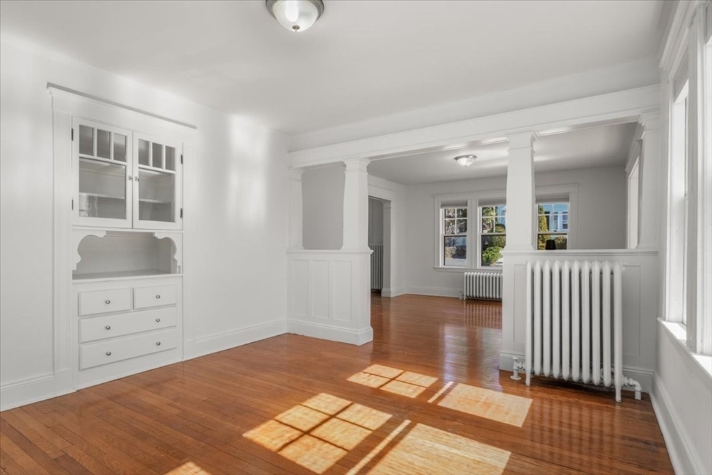 558 Lagrange Street, Unit 1 Boston, MA 02132 - Photo 4 of 40 wooden floor and windows in a room
